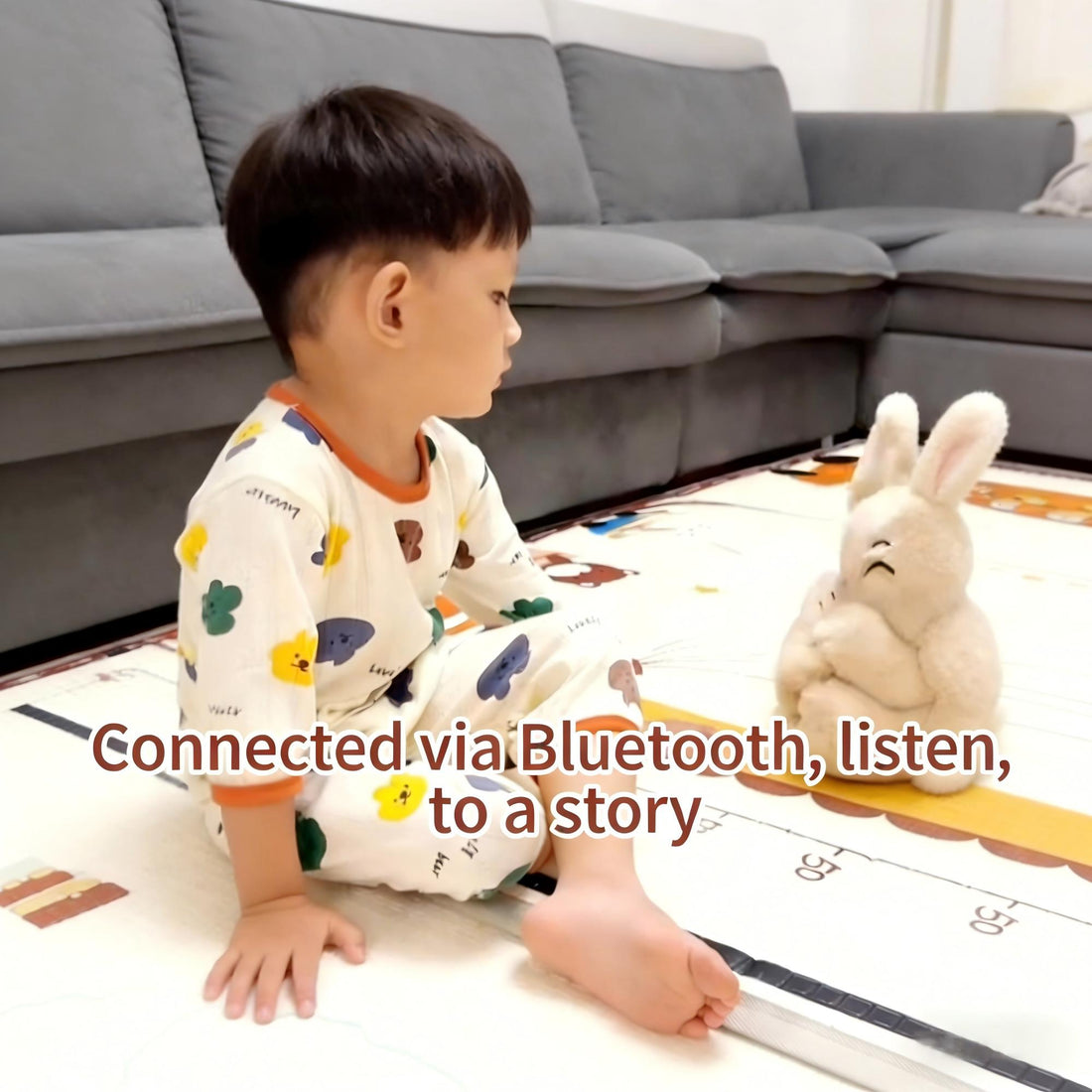 Baby listening to story via Bluetooth plush rabbit toy, interactive educational toys for toddlers